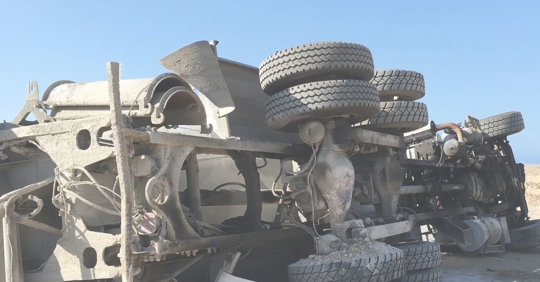 an overturned 18-wheeler